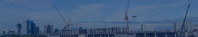 Großbaustelle mit Kränen aus der Luft